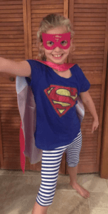 Elli in super hero costume