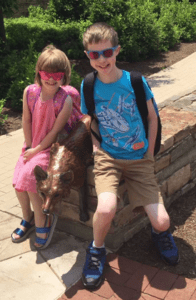 Siblings wearing sunglasses