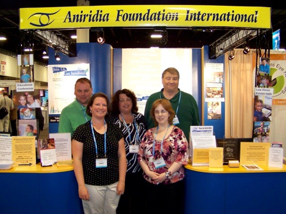 Attendees at AFI trade show booth